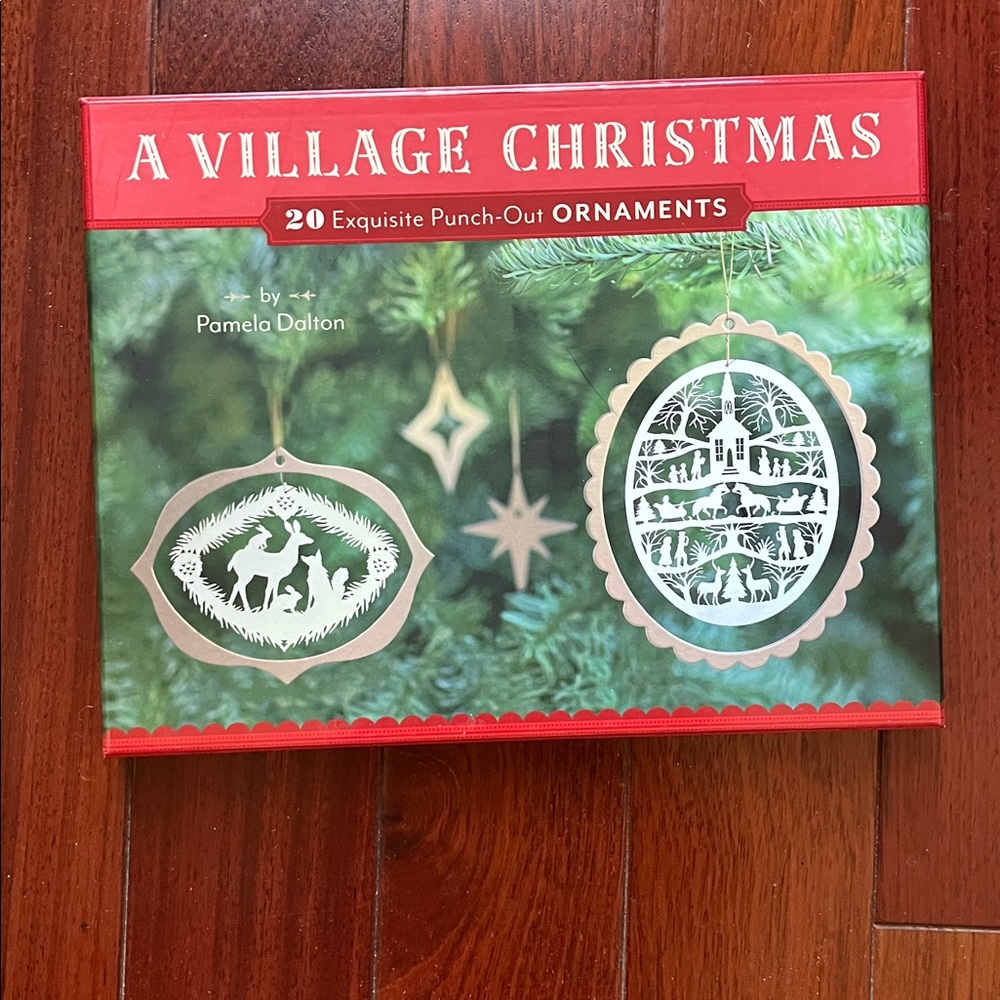Pamela Dalton punch out exquisite Christmas Ornaments- A Village Christmas